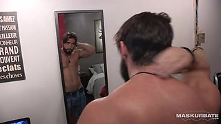 Muscled gay hunk jerks off thick cock