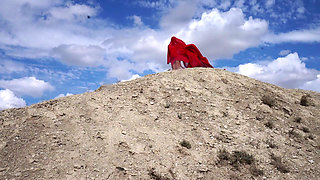 On Top of Hill with Red Flag