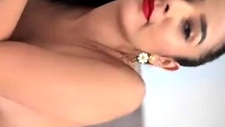 Busty curly brunette with big boobs fucks on couch