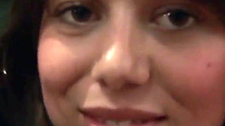 Sexy brunette masturbates with a dildo in front of the video cameras