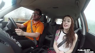 Red-haired learner driver fucks her driving instructor in the car