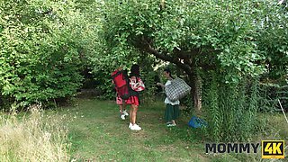 Busty milf rides stepdaughter's boyfriend in front of her