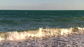 Ashlyn Lee goes fishing, but she would rather enjoy a masturbation session on the sand. She gets caught on-camera by our voyeur videographer.