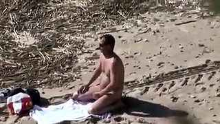 A Voyeur Films A Couple On Beach