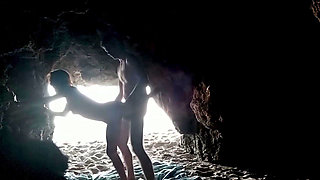 Couple recorded at the beach, inside the cave