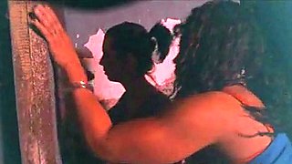 Two Hookers Take Turns Sucking Cock at Gloryhole
