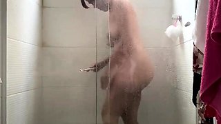 Day 8 #Voyeur - She is taking a shower, her assets is