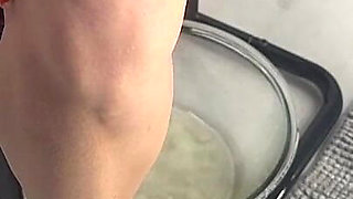 Beautiful Legs Are Peeing Into a Salad Bowl