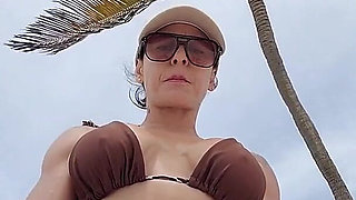 Giant Muscular Goddess on the Beach