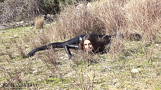 Flexible in a Black Catsuit