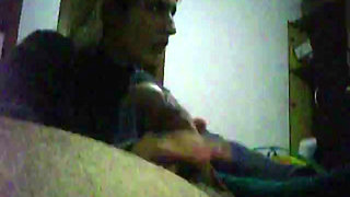 young blonde gives a handjob on friend until he cums