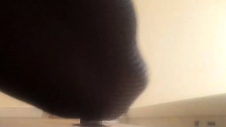 High-Heeled Milf Sucks and Fucks in a Catsuit at a Gloryhole