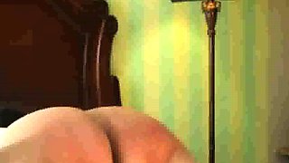 Lashing slut Mary's fat old ass with the belt