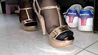 Sexy policewoman catches man stealing panties, spanks, and pisses on his body as BDSM punishment