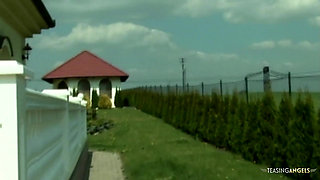 An Asian woman with a large buttocks engages in sexual activities with aroused men in an outdoor setting