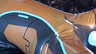 Latex Danielle is attached to the bed and masturbated with the massage vibrator