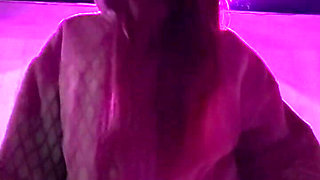 Smoking a Cigarette Outdoor While Wearing Only a Bikini and a Jacket