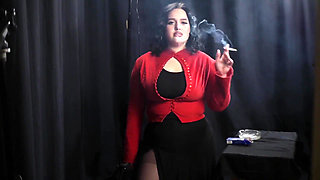 Curvy Brunette Smoking in Red Cardigan