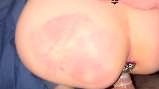Doggystyle and Spanking with a Girl Plugged