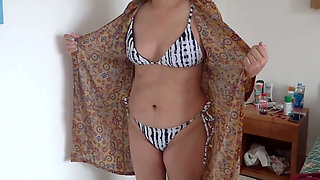 Full Video of a Stepmother Showing off in a Bikini and Lingerie. Would You Like to Meet Her? Would You Fuck Her?