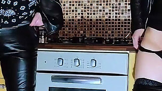 Two Whores Had a Pissing Session in Their Kitchen.