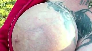 Blonde is flashing her big boobs in the outdoors