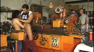 Brunette gang banged in mechanic shop