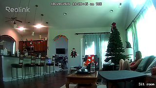 Camera catches MILF playing with pussy on couch