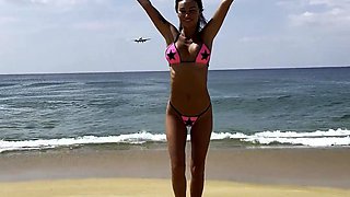 Monika Fox Poses In Pink Bikini With Stars On Beach