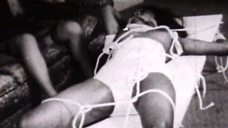 Black-and-white Vintage Bondage Classic with Rope-bound Retro Submissives