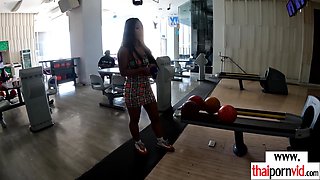 Amateur Thai teen Noom feeding her pussy