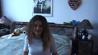 Amateur playing with her hole in front of the camera