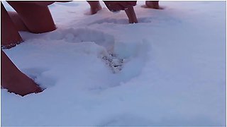 Femdom. Two Busty Women Piss Naked In The Snow, Then Make A Naked Guy Eat And Lick The Yellow Snow