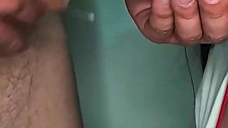 A Married Nurse with an Engagement Ring Helps Patients Get a Sperm Test