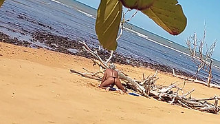 Ladysilva was filmed hiding tanning her hot ass on the beach