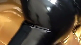 Latex Lovers Encased in Gold