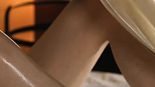 Girl in Latex lingerie and stockings masturbates with magic wand