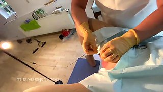 Dominatrix mistress April - clinical cock stitching