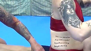 Two Tattooed Chicks Tickling Their Slave in the Gym