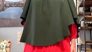 Fatima in red dress and green Khimar