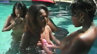 Four sexy ebony babes at poolside muff diving and using dildos to fuck tight twat