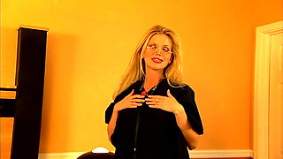 Sexy blonde babe masturbating on her bed