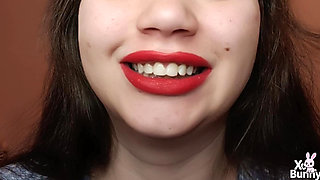 Big red lips smoking close up