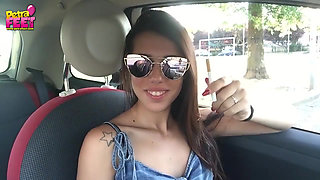 Cute teen Petra smoking in the car
