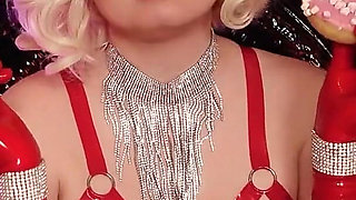 Sexy Pin up Girl Eating Donuts in Latex Gloves