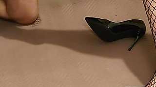 Ballbusting in fishnet stockings