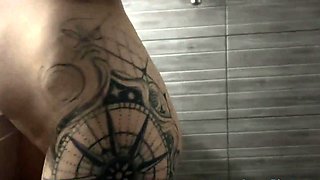 Blonde babe fists herself in the bathroom with a sex toy