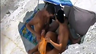 Peeking at stepdaughter and BF on beach