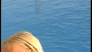 Blonde girl sucks a huge dick to a tits cumshot by the pool