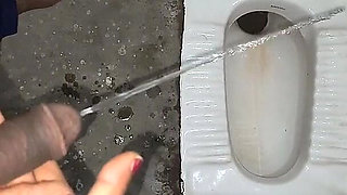Desi Bhabhi Holding Stepbrother-in-law's Penis and Making Him Pee and Peeing Herself